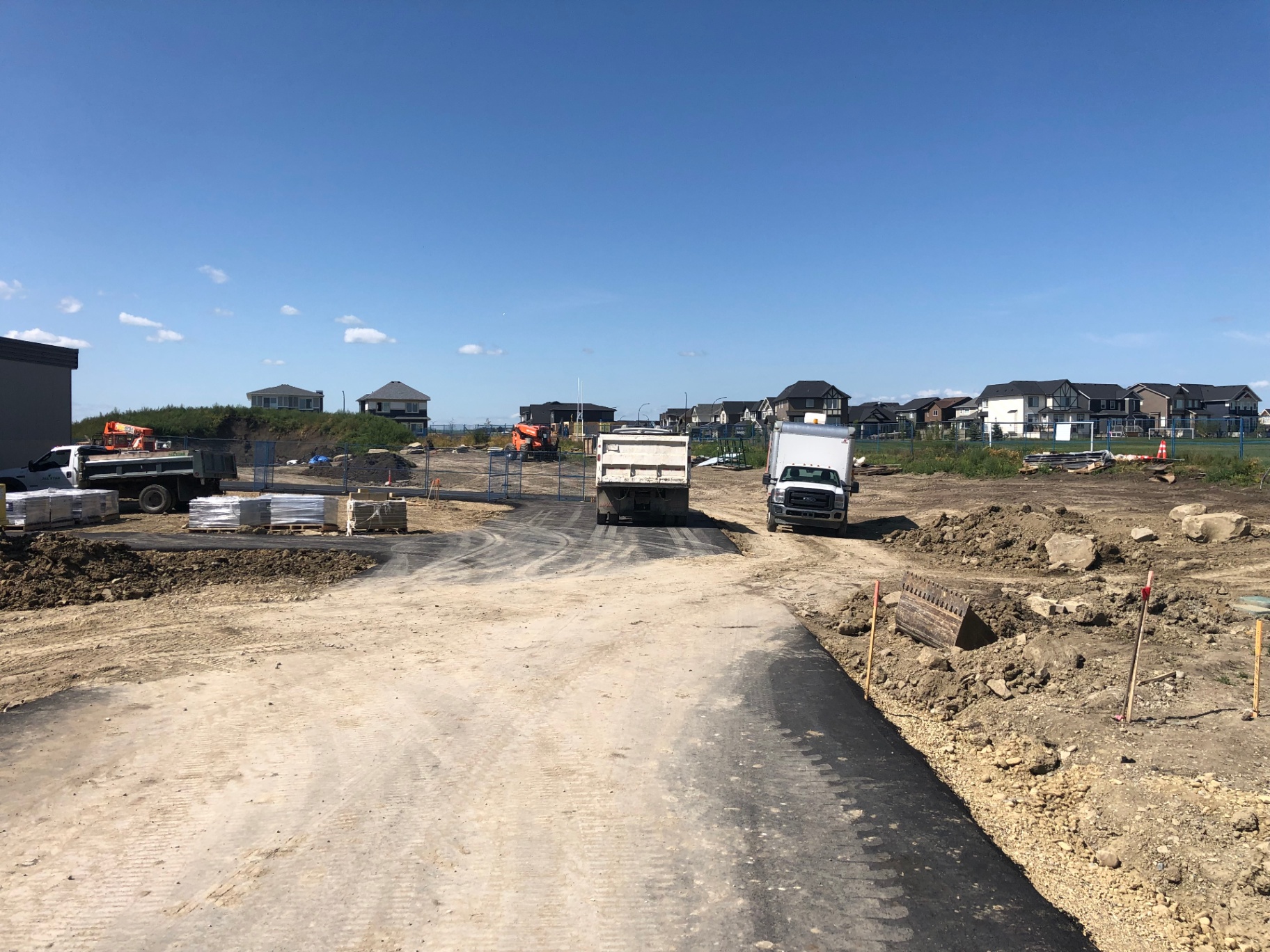 Site grading and prep work at a new commercial build with All Star trucks on site