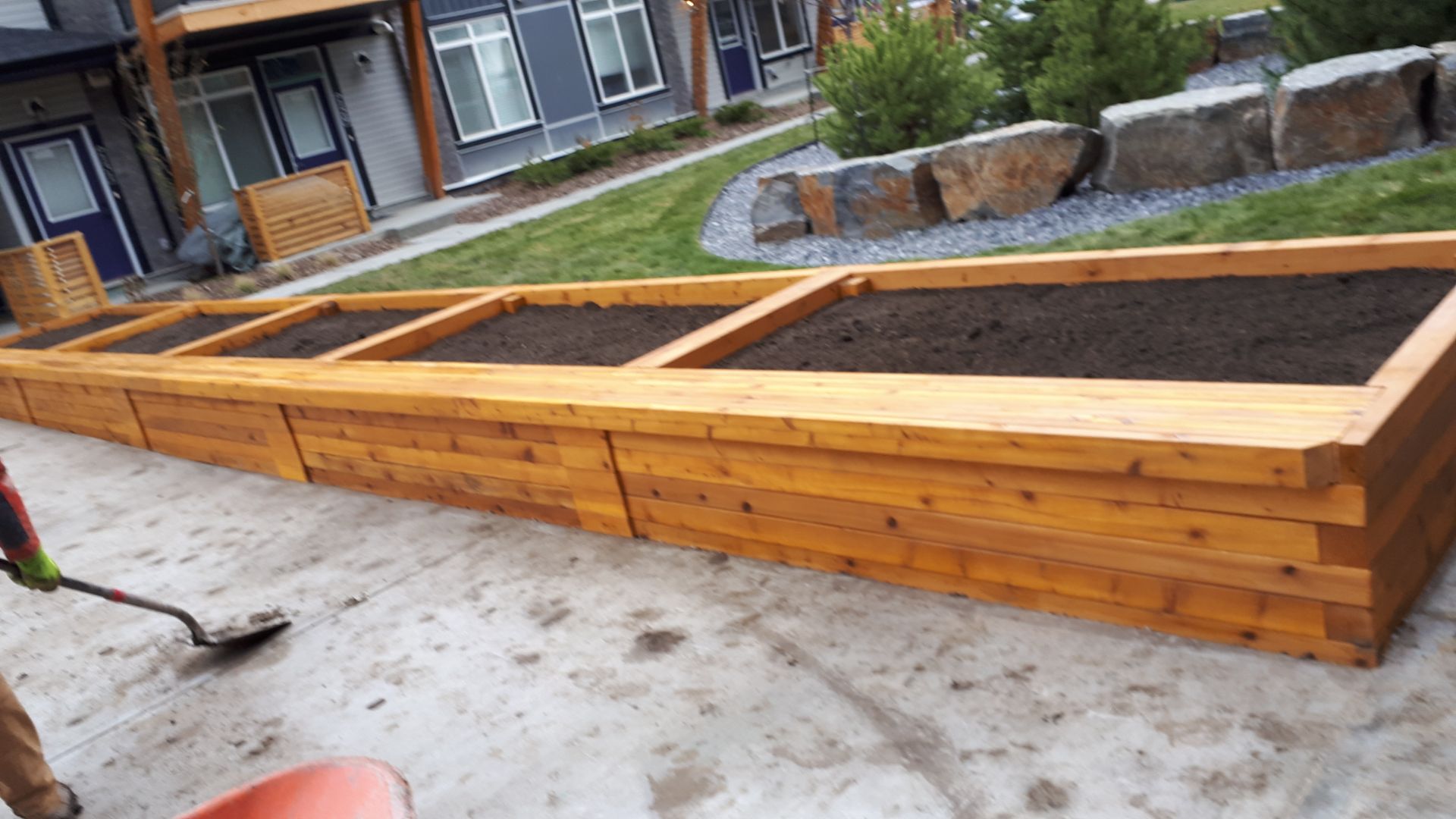 Cedar raised planters filled with soil and ready for planting