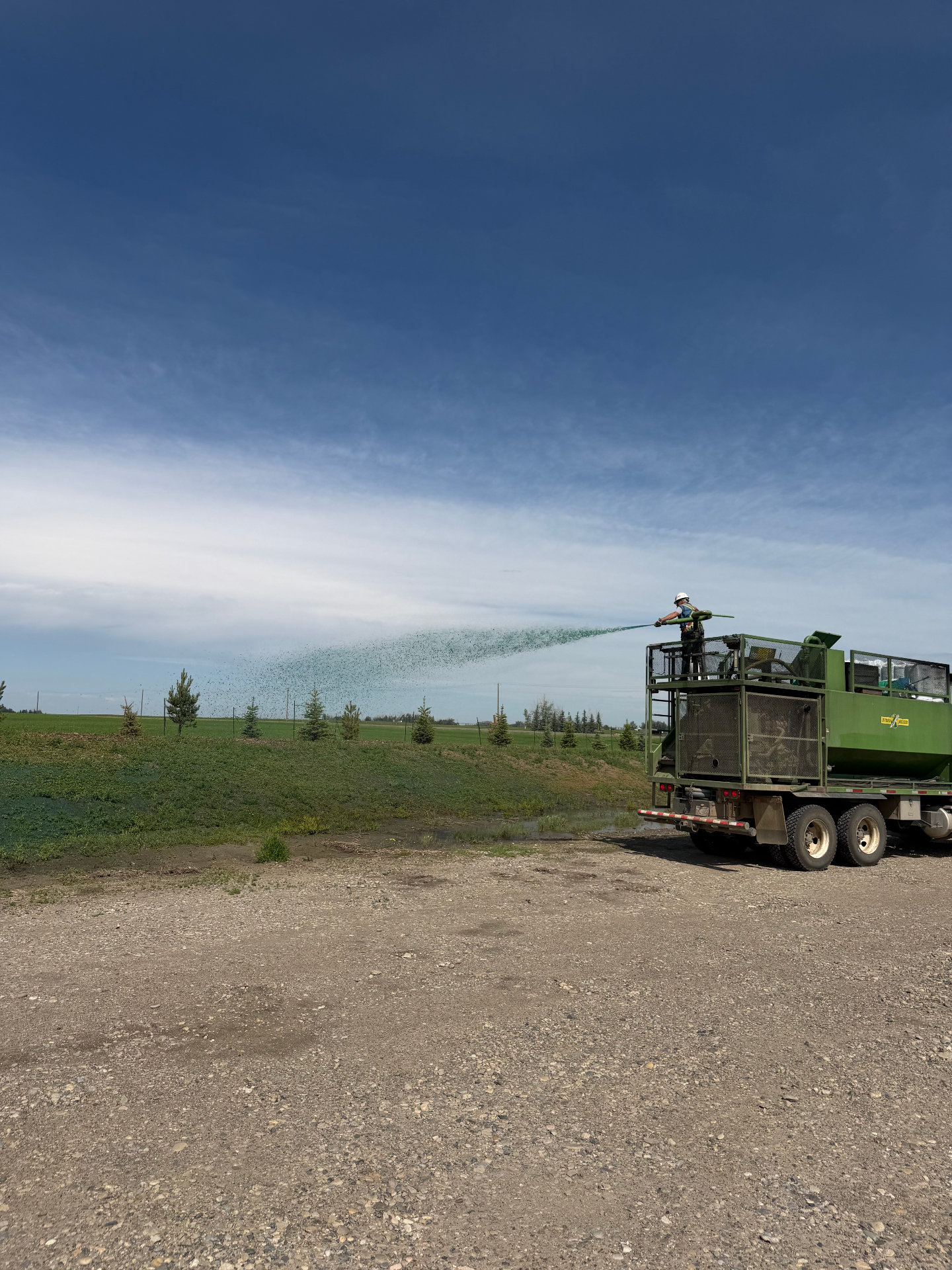 All Star hydroseeding truck spraying fresh grass onto a slope